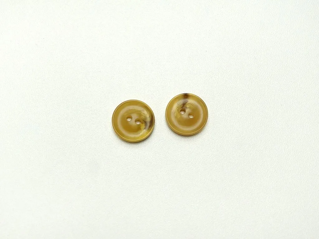 Пуговица пластмассовая, два прокола, горчичный меланж, диаметр 18 ммизображение
