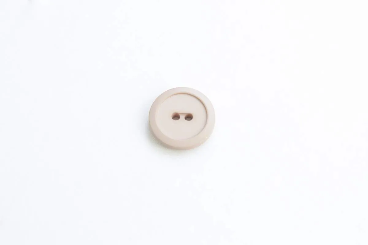 Пуговица пластмассовая, 2 прокола, цвет пудровый матовый,  диаметр 19 ммизображение