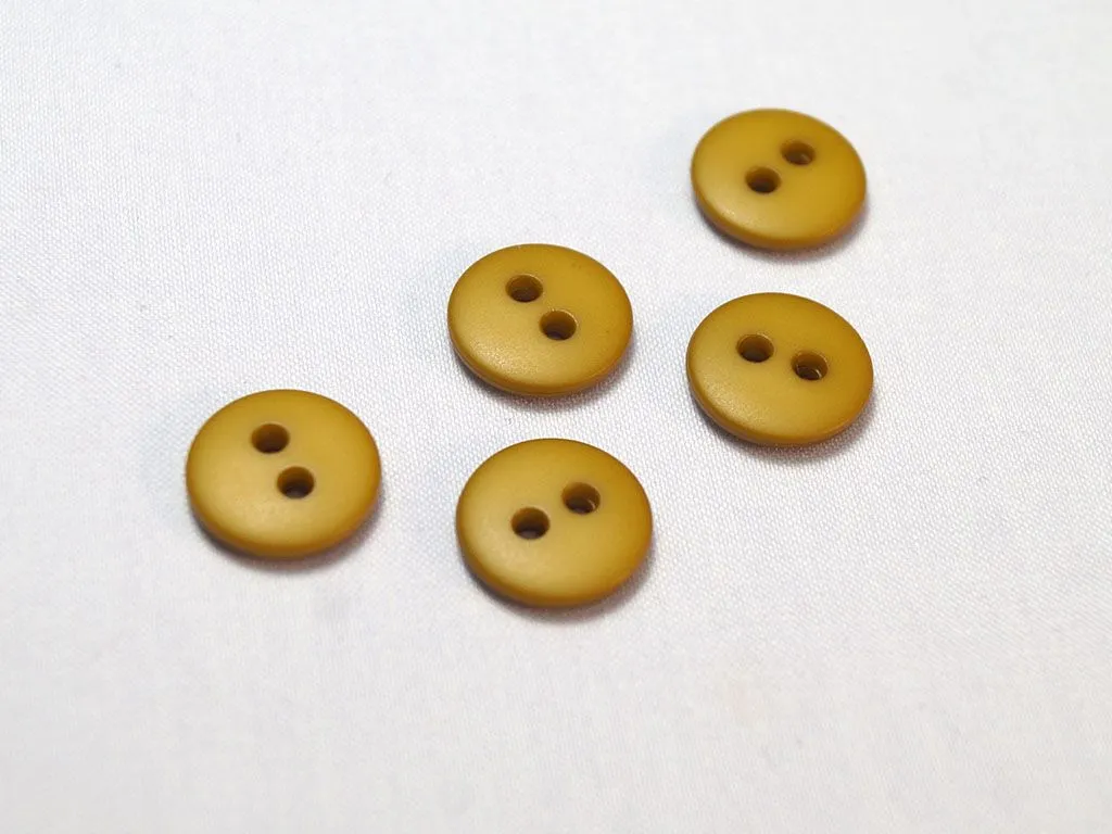 Пуговица пластмассовая, два прокола, горчичного цвета, диаметр 11 ммизображение