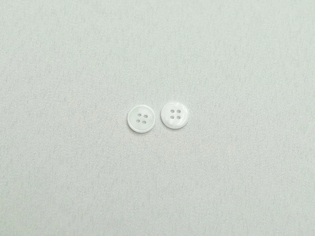 Пуговица рубашечная, 4 прокола, белый меланж, матовая, диаметр 11 ммизображение