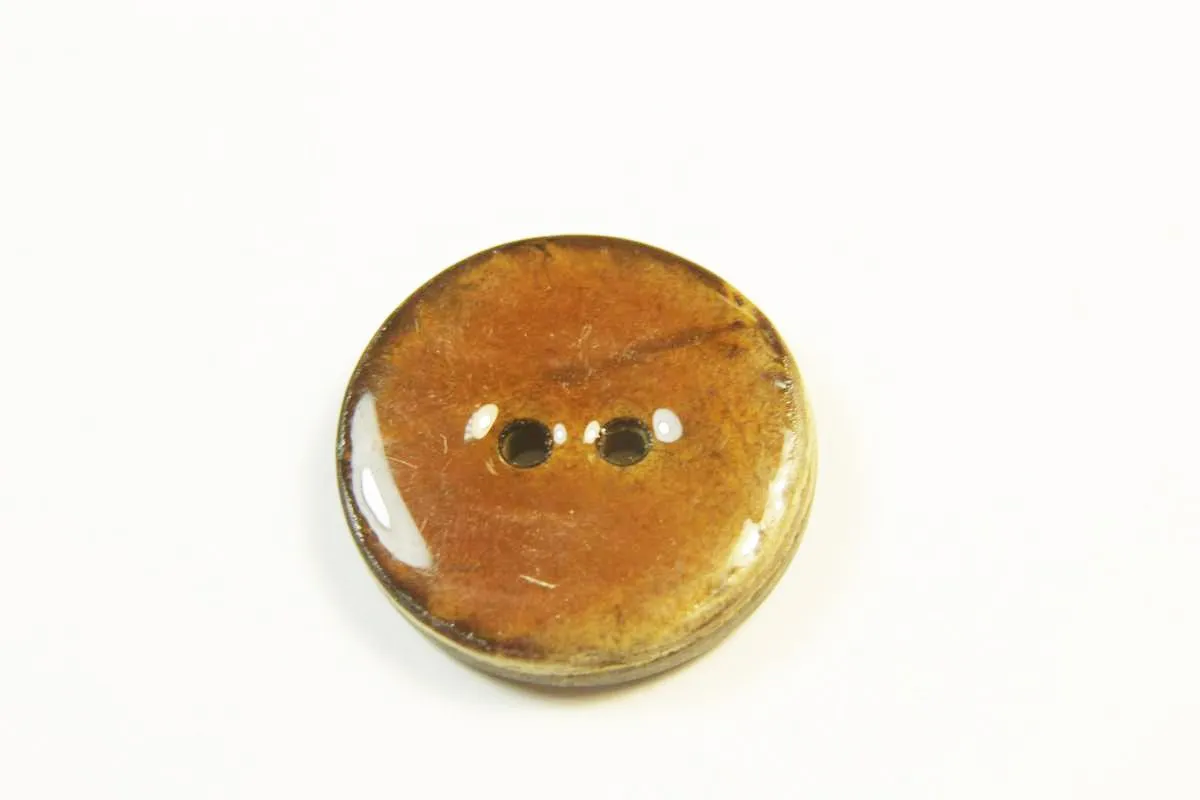 Пуговица пластмассовая, два прокола, пёстрого коричневого цвета, в коричневой глазури, диаметр 21 ммизображение