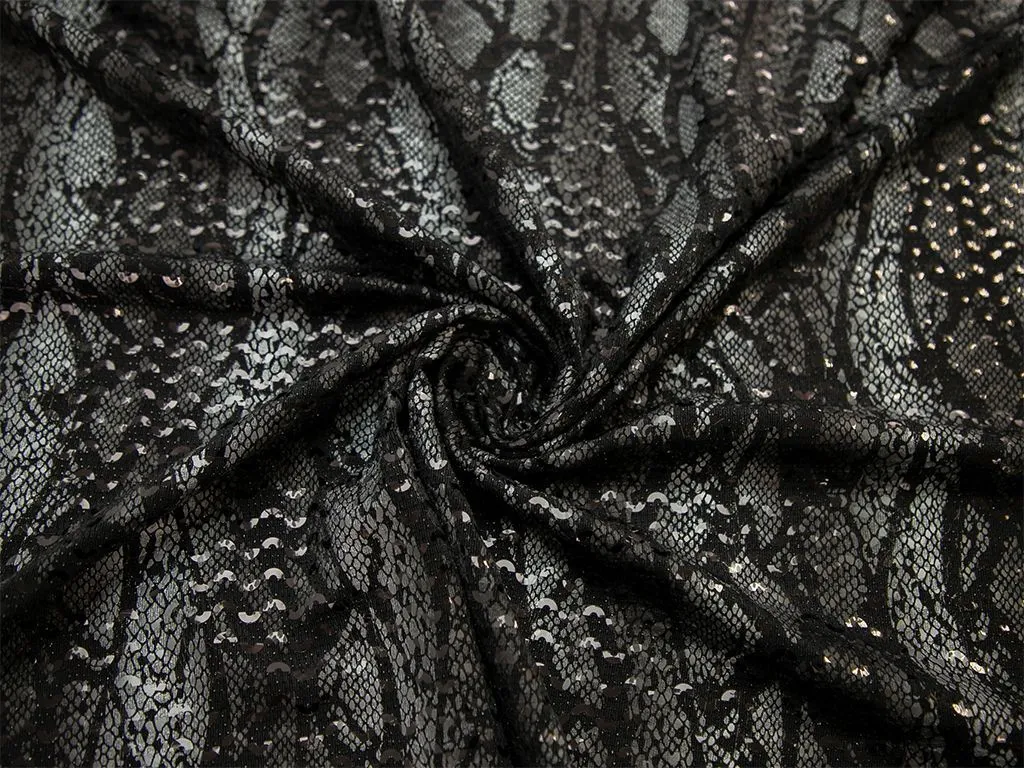 Трикотаж с пайетками и принтом "змея", цвет черно-серыйизображение