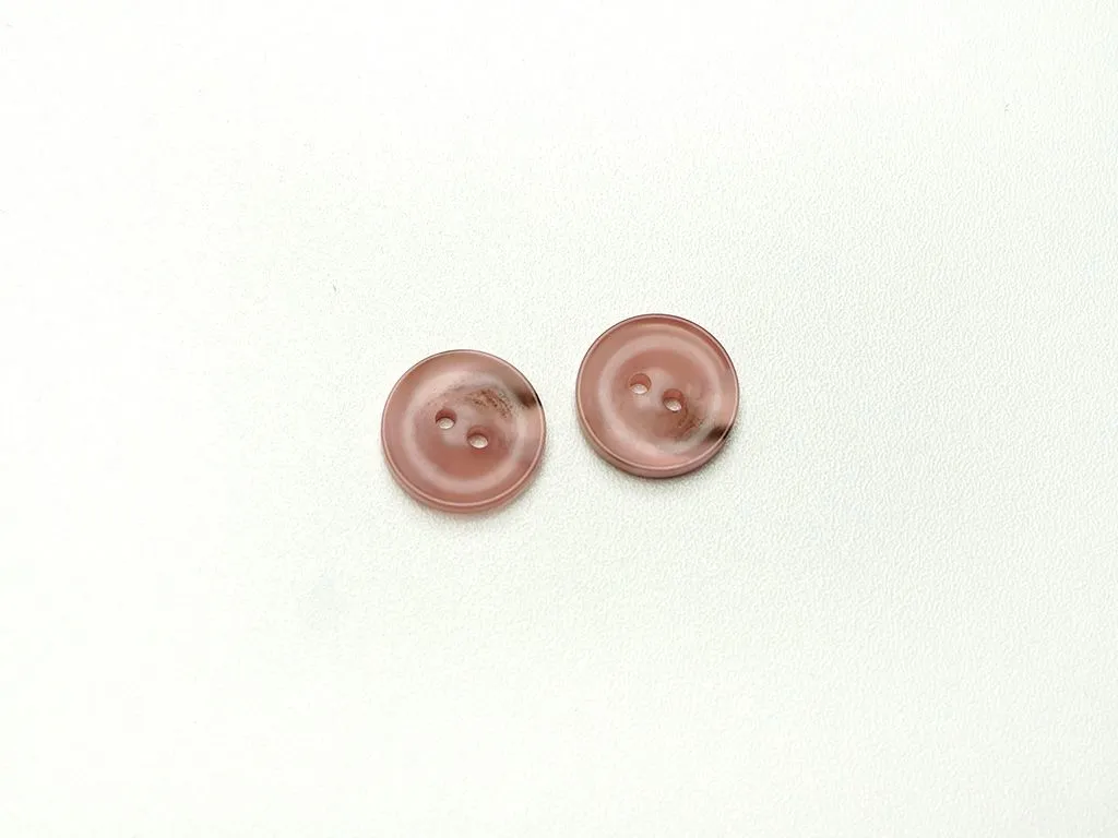 Пуговица пластмассовая, два прокола, розовый меланж, диаметр 18 ммизображение