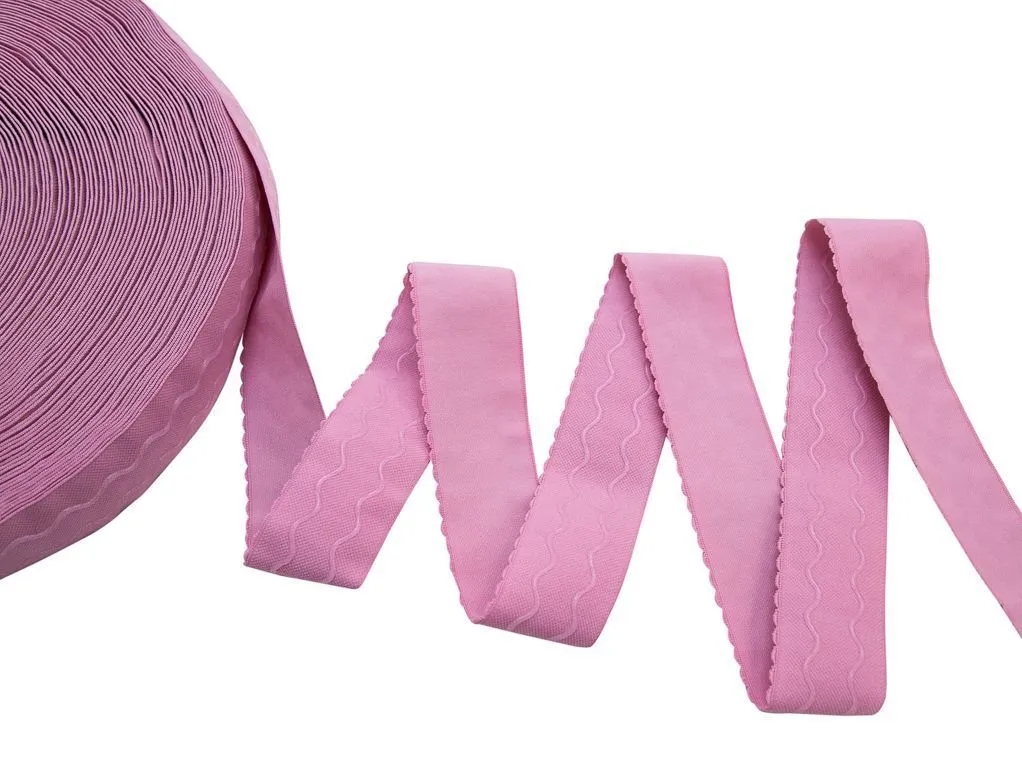 Тесьма-резинка трикотажная, с фигурным краем,с силиконовыми рельефами,розового цвета, ширина 40 ммизображение