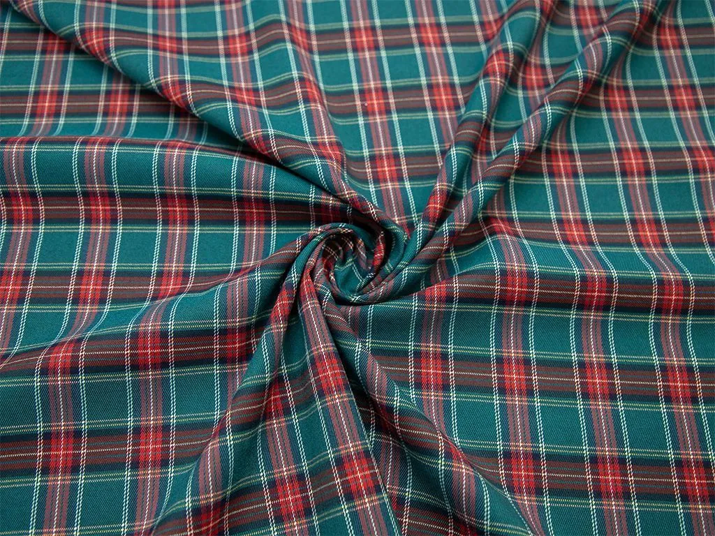 Двухсторонняя костюмная ткань в клетку тартан на зеленом фонеизображение