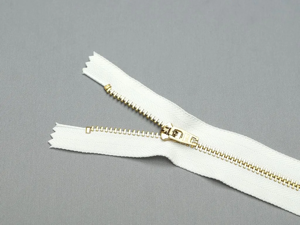 Молния джинсовая, с металлическим звеном, тип 4, белый/золото, длина 18 смизображение