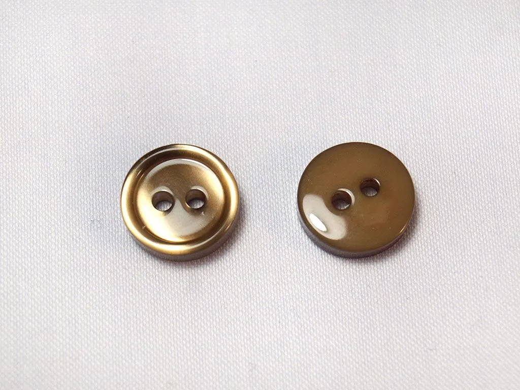 Пуговица пластмассовая, два прокола, коричневый перламутр, диаметр 10 ммизображение