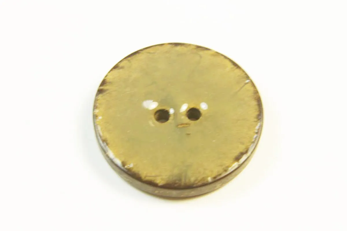 Пуговица пластмассовая, два прокола, пёстрого коричневого цвета, в серой глазури, диаметр 27 ммизображение
